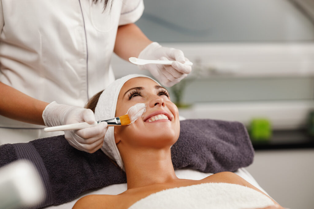 Person receiving facial treatment